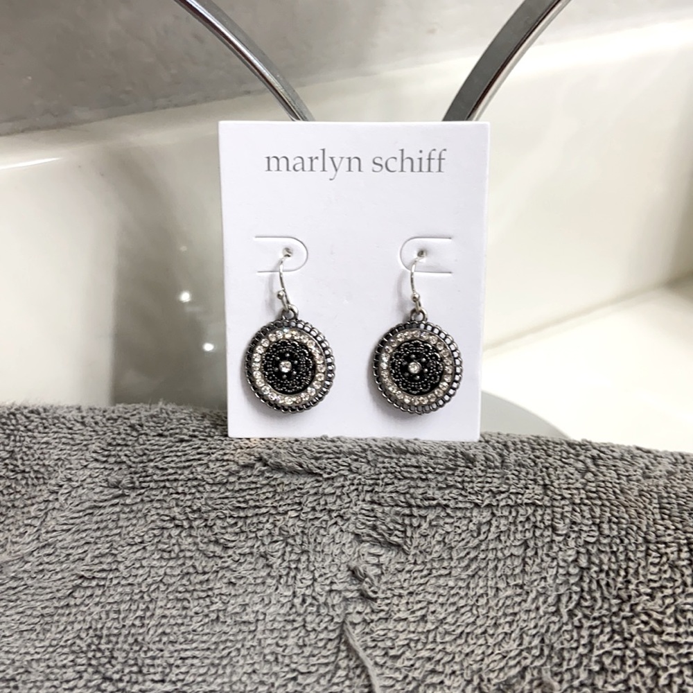 Black silver and stones. Brand New, never worn